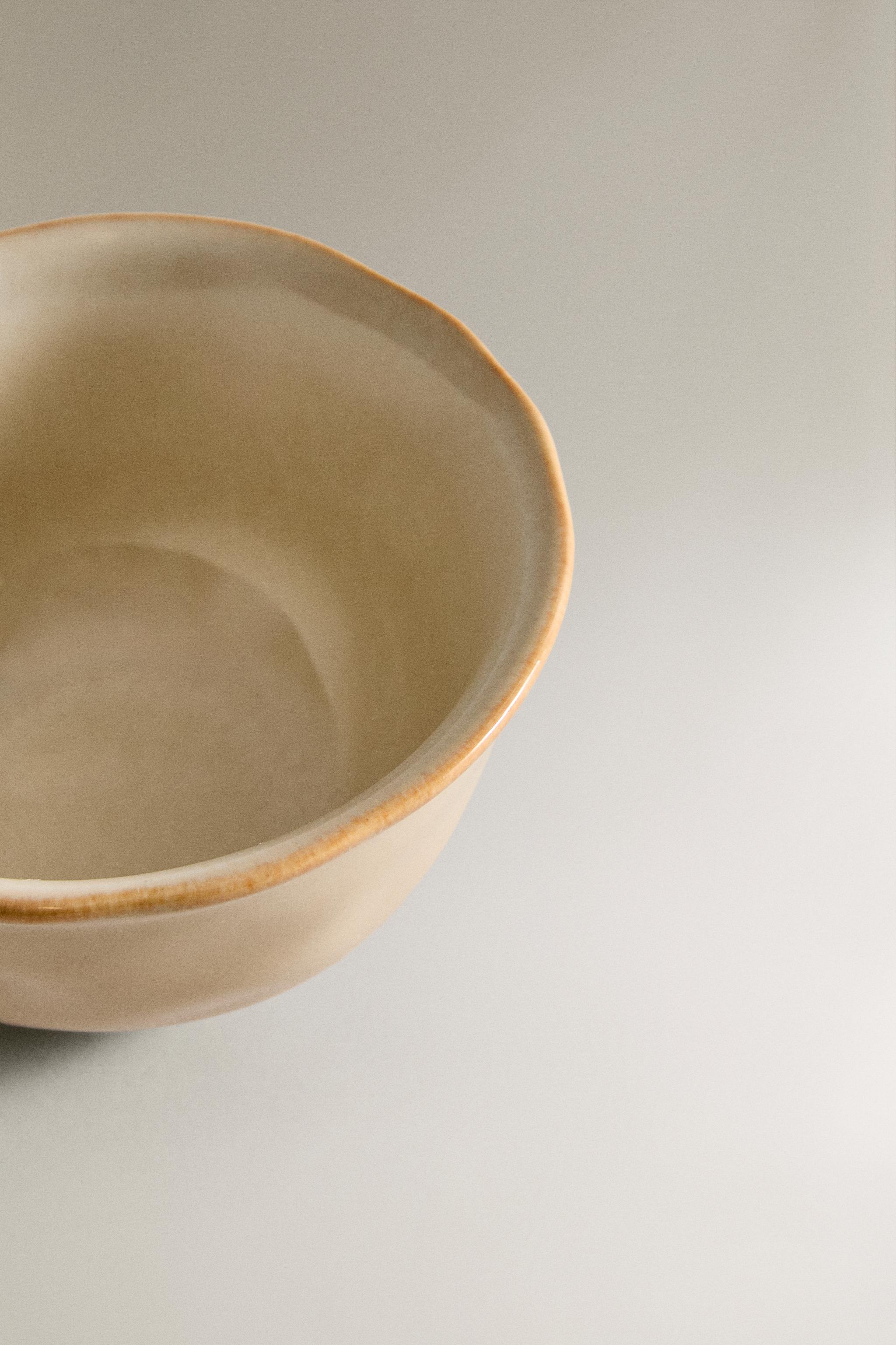 STONEWARE BOWL WITH IRREGULAR EDGE
